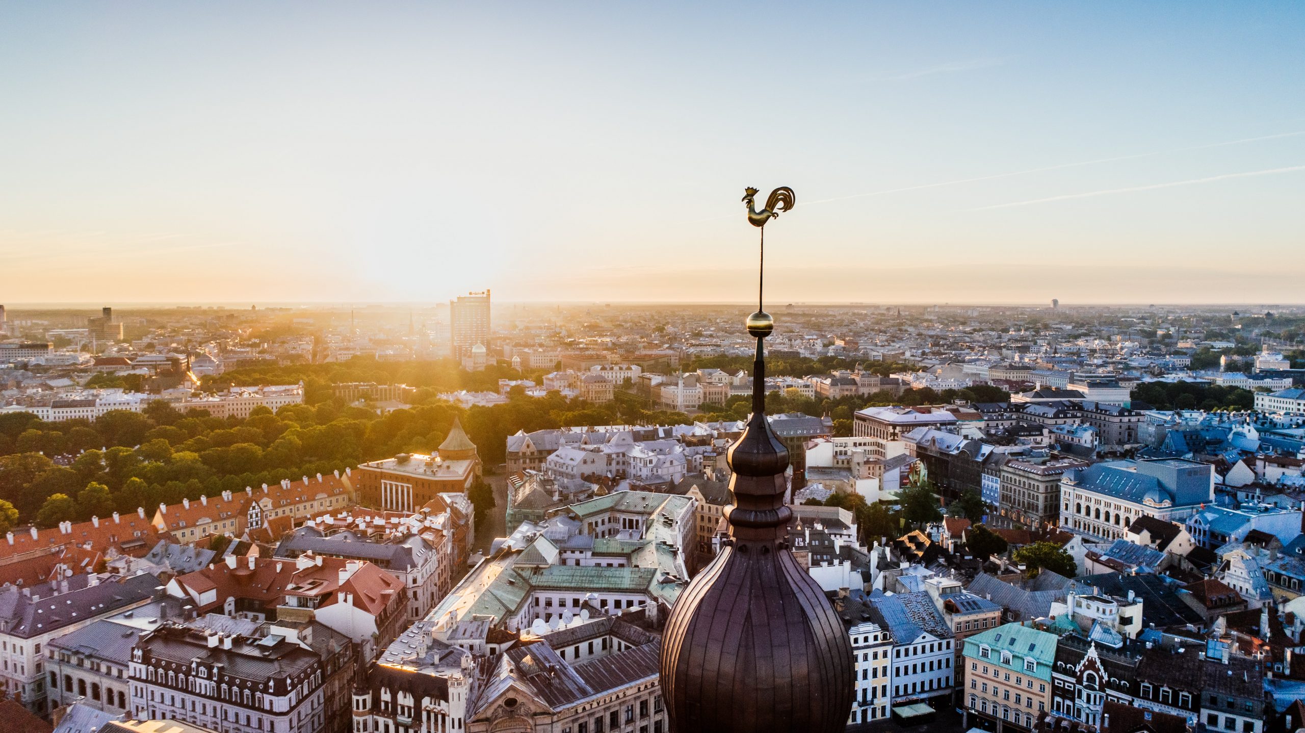 A view of a city from the top of a building in Riga.