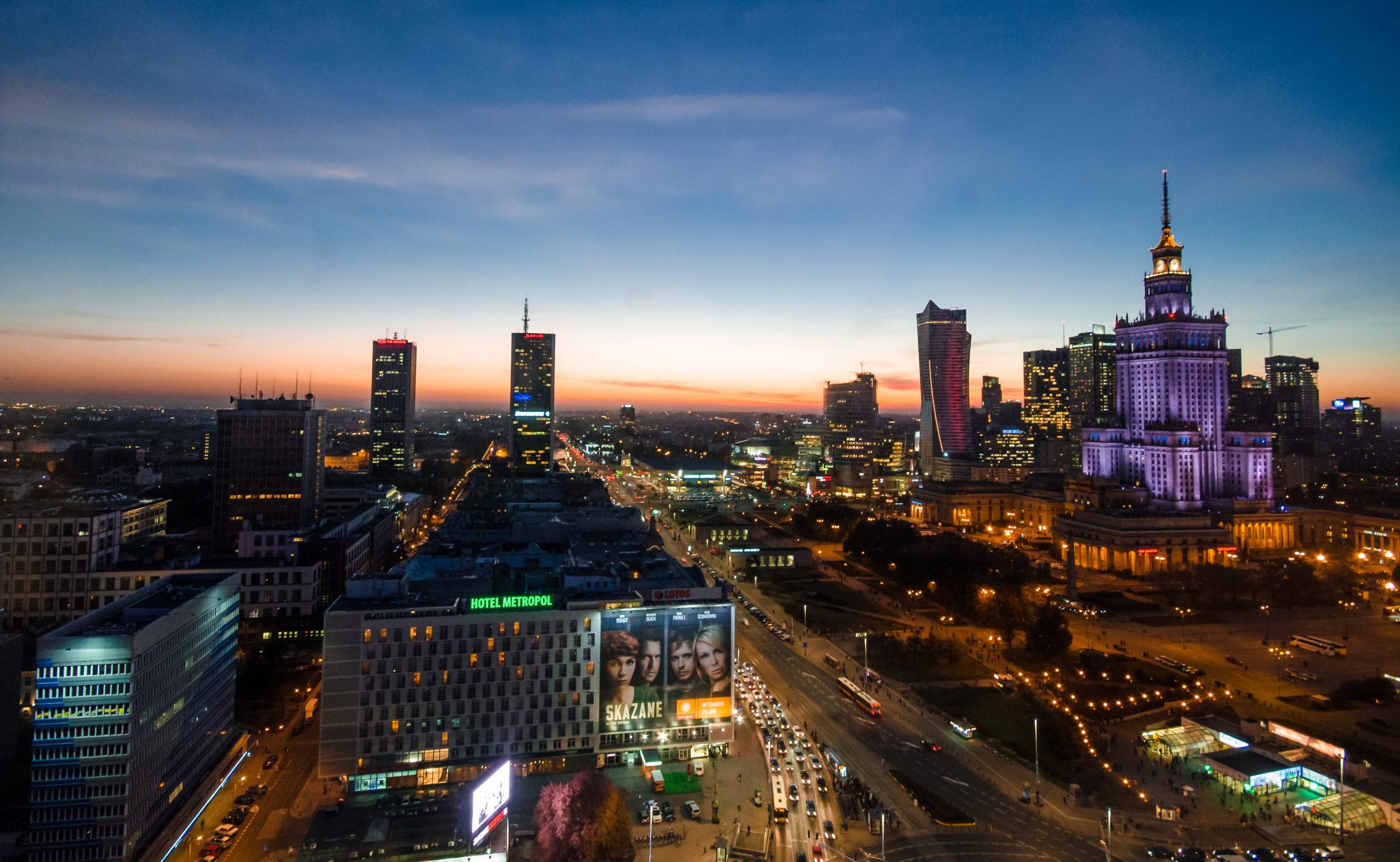 A view of the city skyline at dusk in Warsaw.