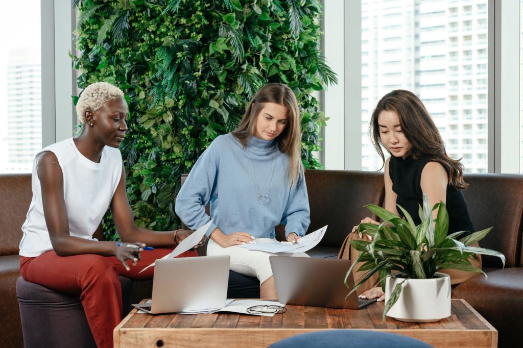 Desk with plants in a coworking space